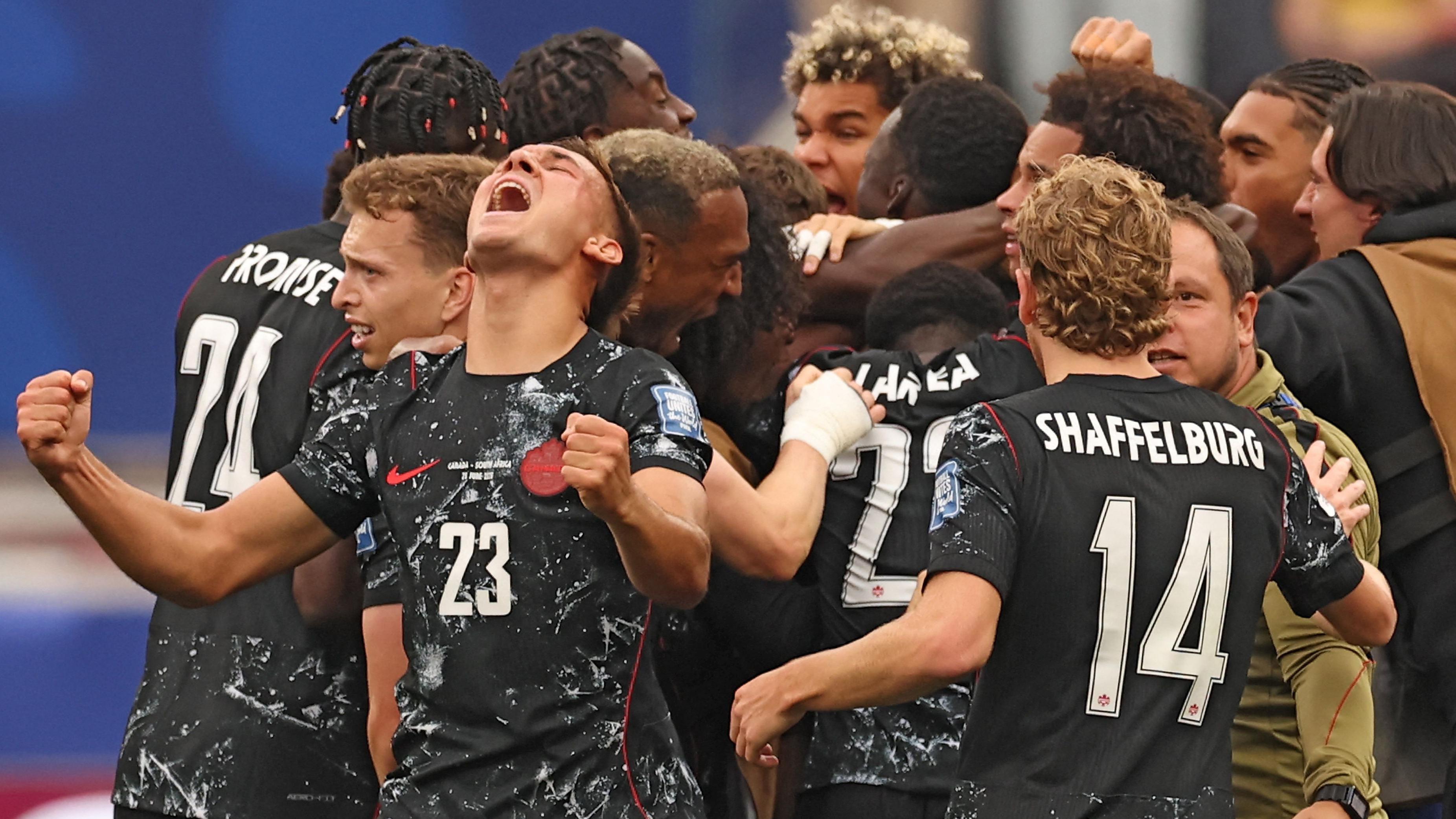 Canada into World Cup last 16 with 92nd-minute winner against South Africa