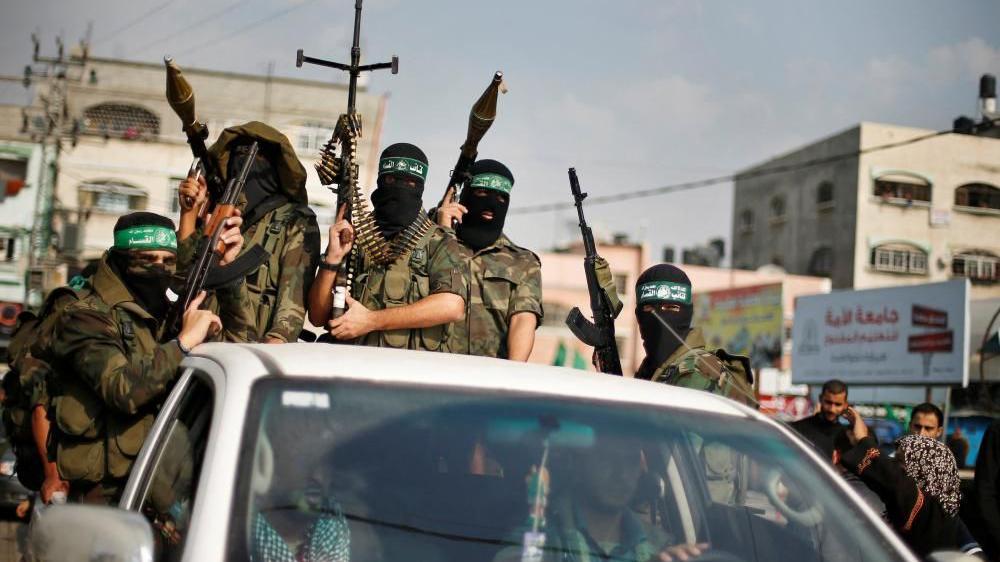Israeli official says troops wont pull back in Gaza without genuine Hamas disarmament