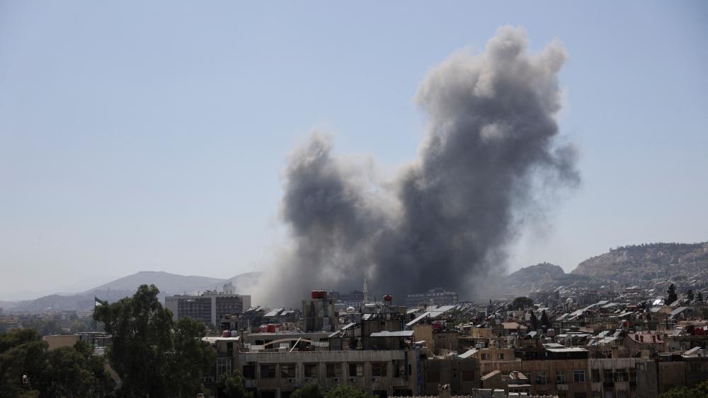 Israel strikes Damascus military HQ as fighting between Syrian forces and Druze continues