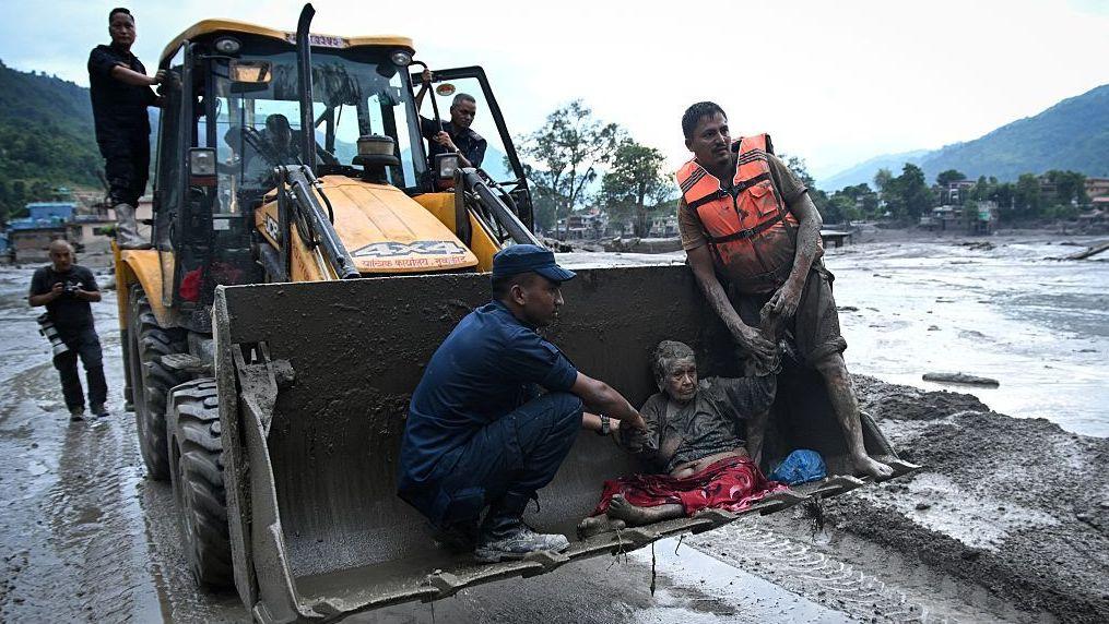 Flash flood on Nepal-Tibet border kills more than 150, with hundreds of tourists missing