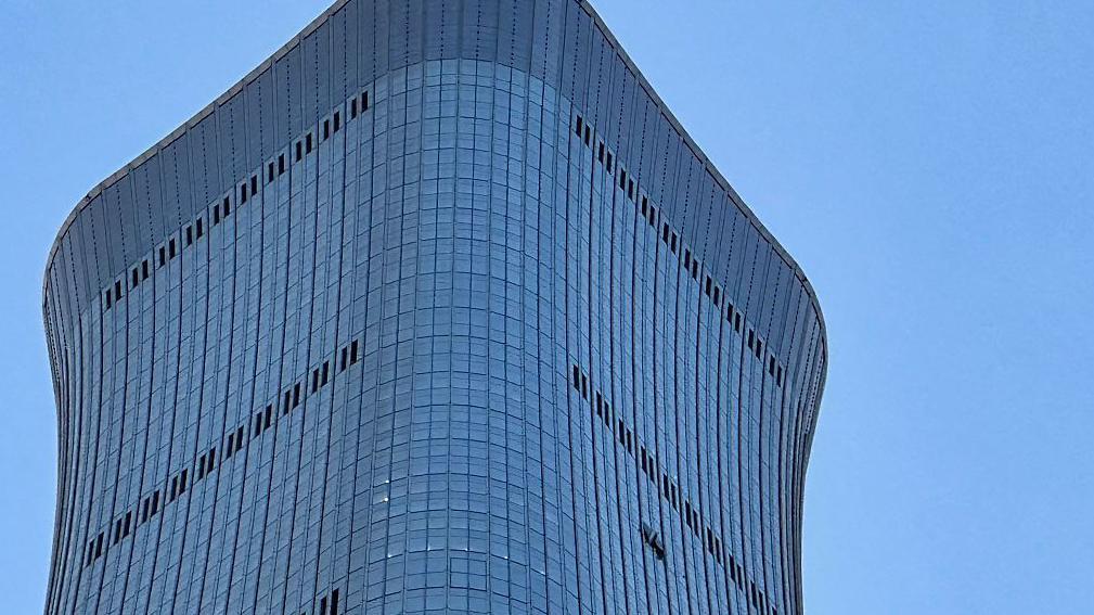 China says pilot crashed small plane into skyscraper for personal reasons