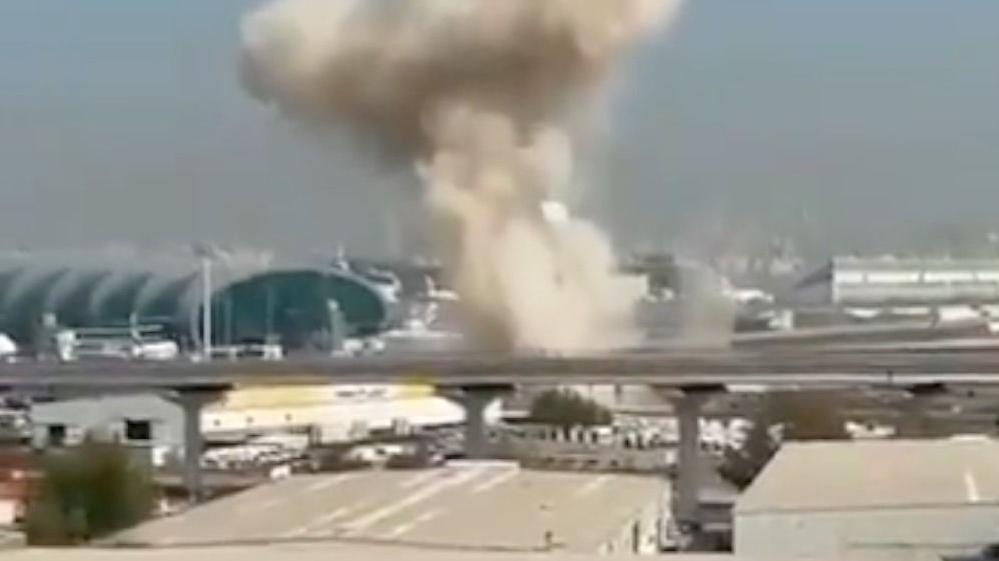 Drone strike near Dubai airport as Iran's president apologises to Gulf nations for attacks
