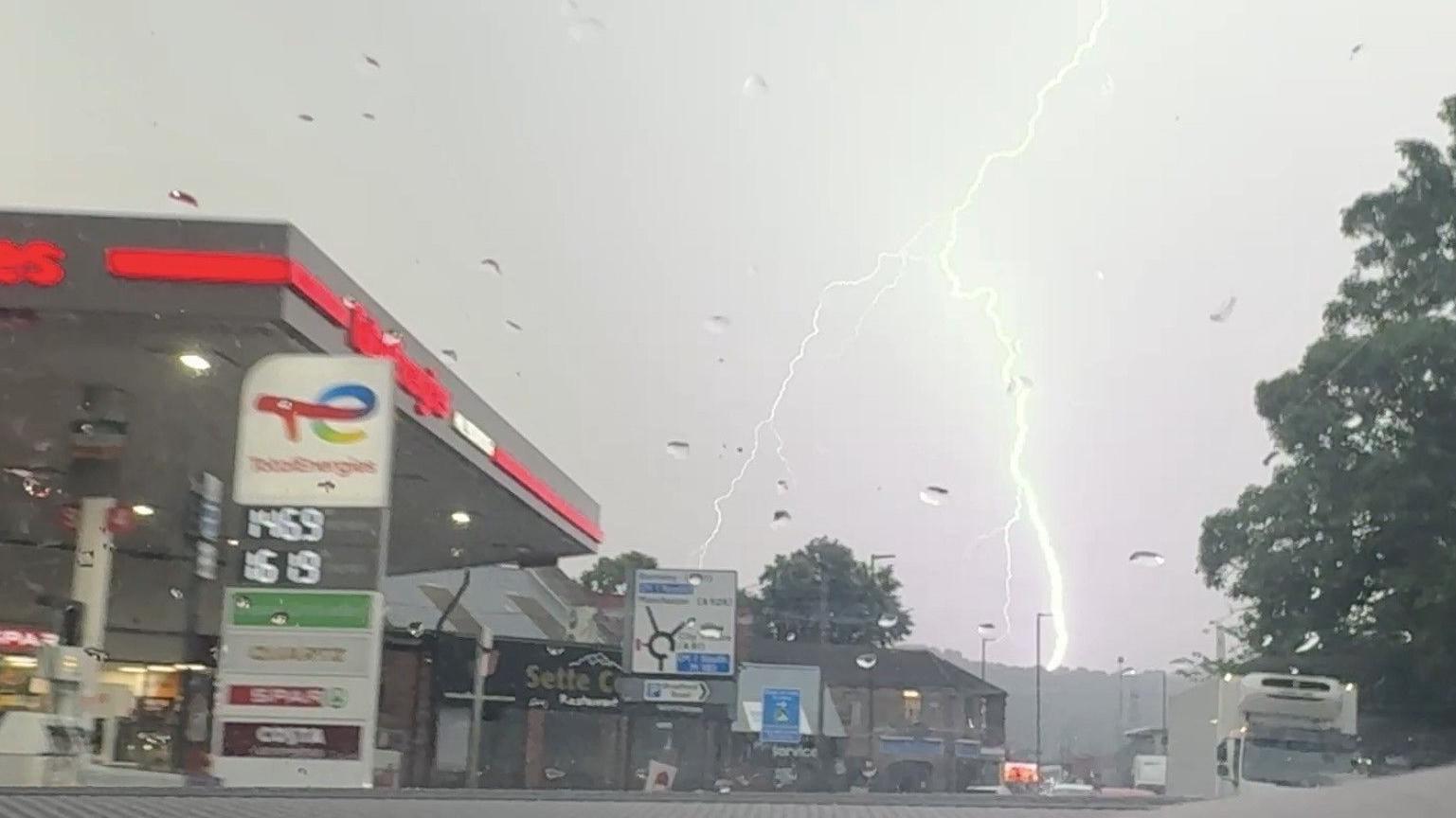Thunderstorms hit parts of UK as red extreme heat warning in place for millions