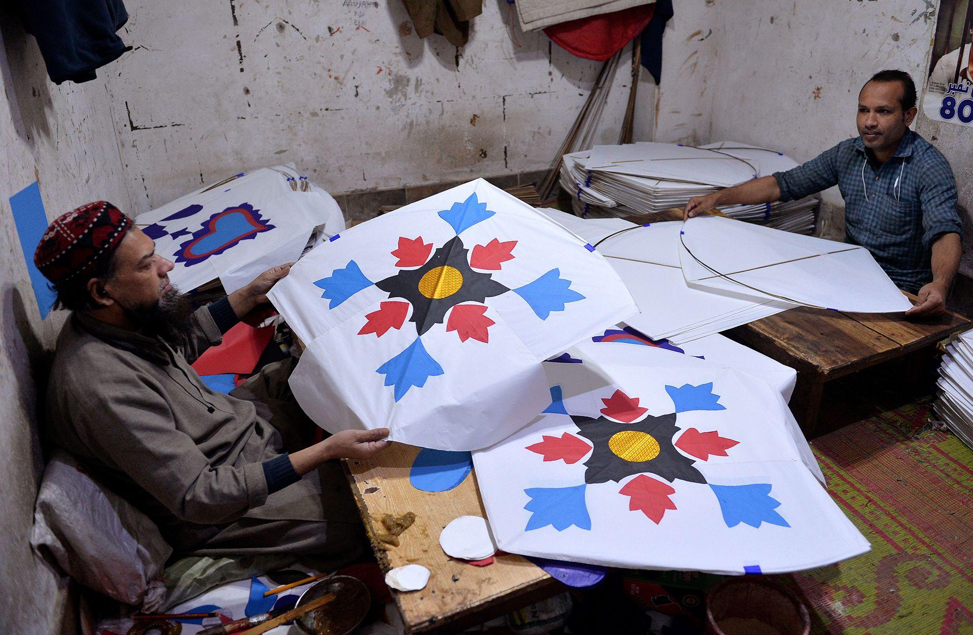 Workers prepare traditional kites at a workshop ahead of the upcoming Basant festival in Peshawar, in Peshawar, Pakistan, 03 February 2026. 