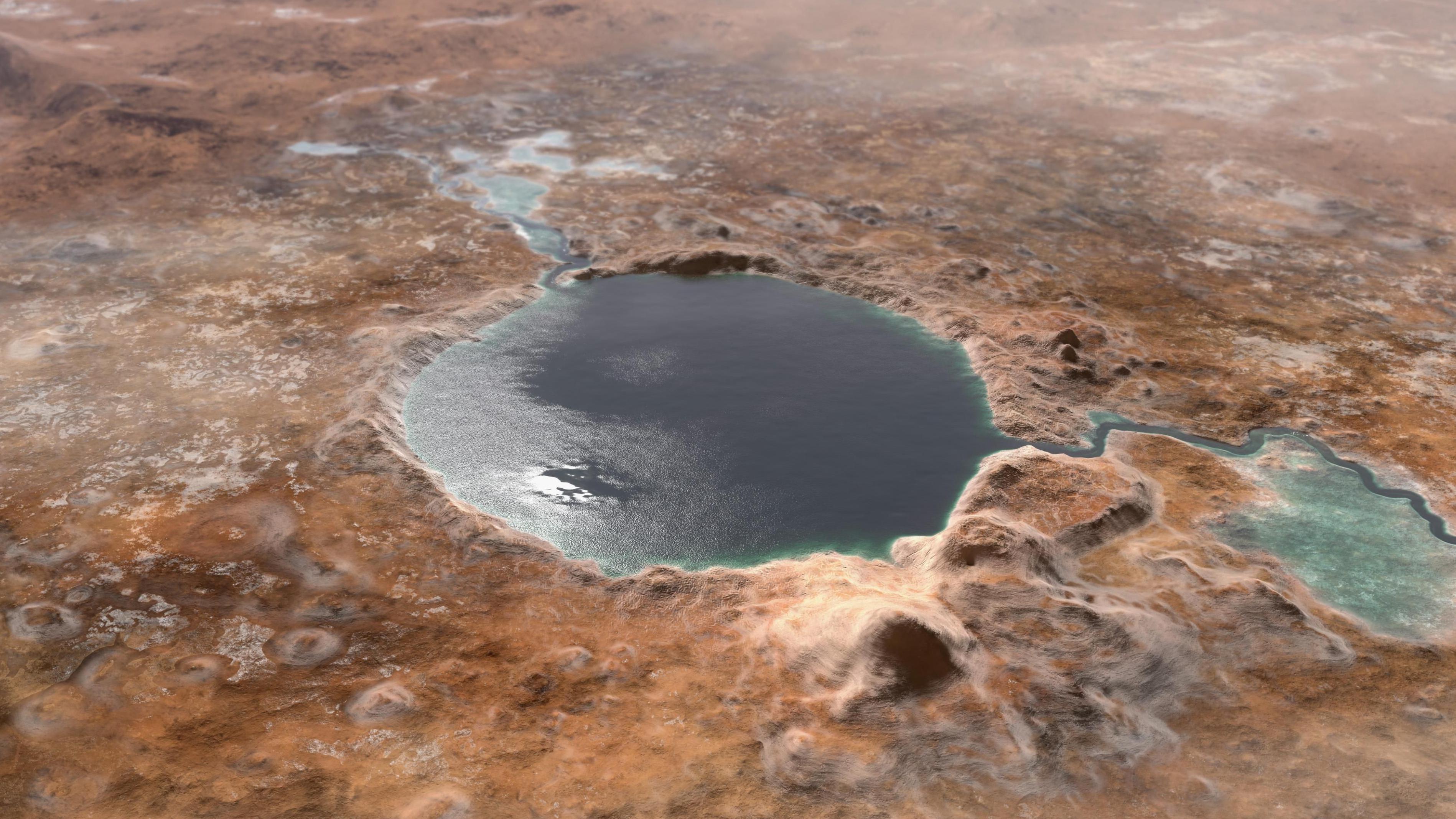 Artist's impression of what the Jezero Crater was once thought to look like. The image shows a large lake filled with dark blue water with a river flowing into it. It is surrounded by a dusty red Martian terrain. 