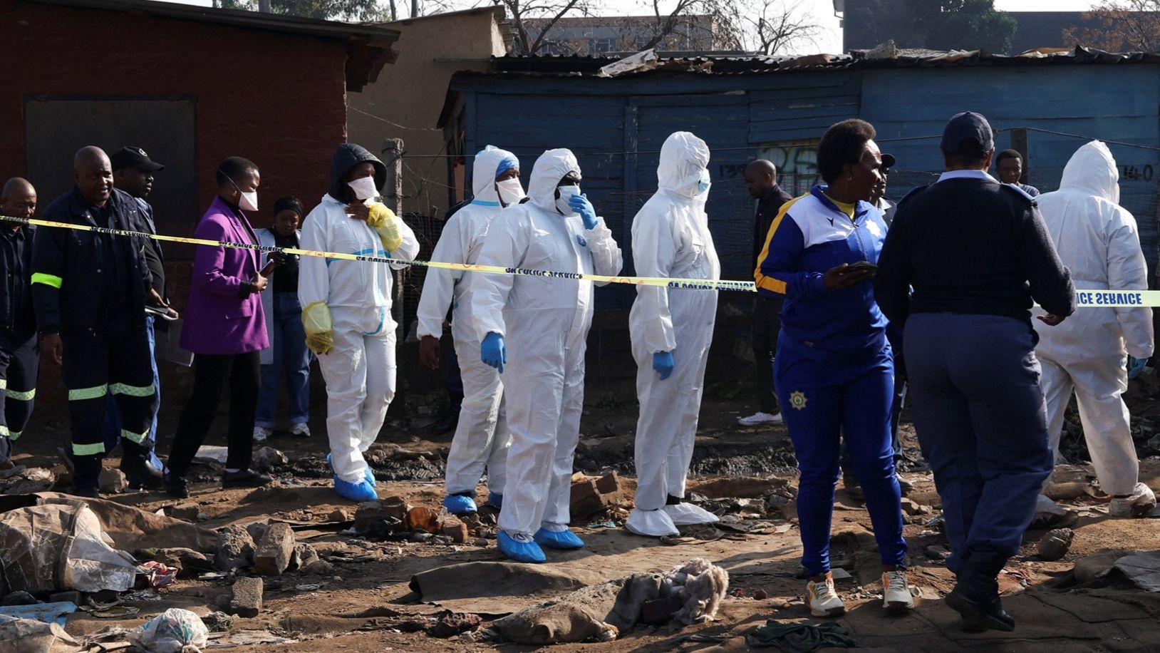 Manhunt under way in South Africa after 12 killed in mass shooting in Johannesburg