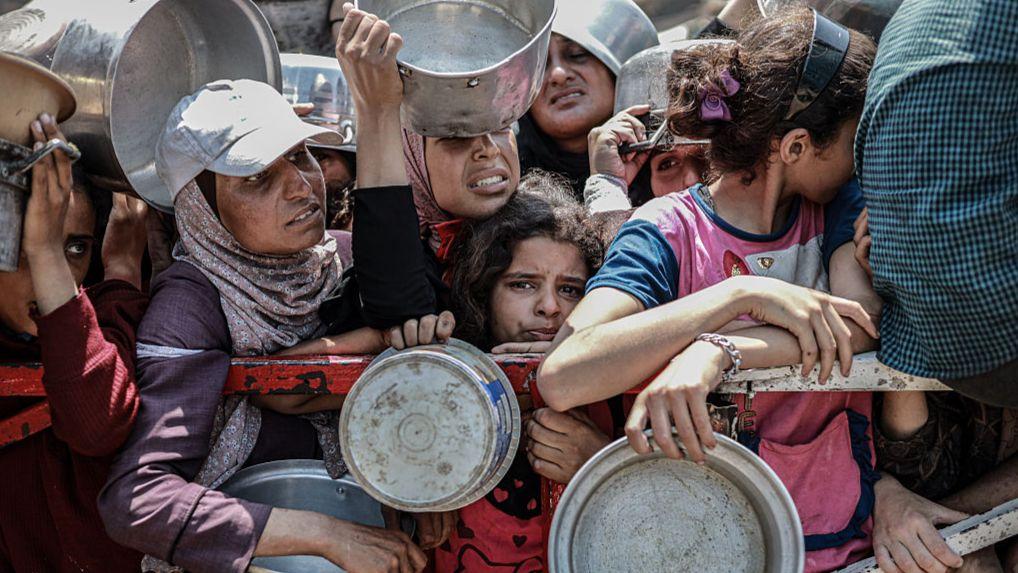 Israel announces 'tactical pause' to fighting in parts of Gaza and says it will open aid corridors