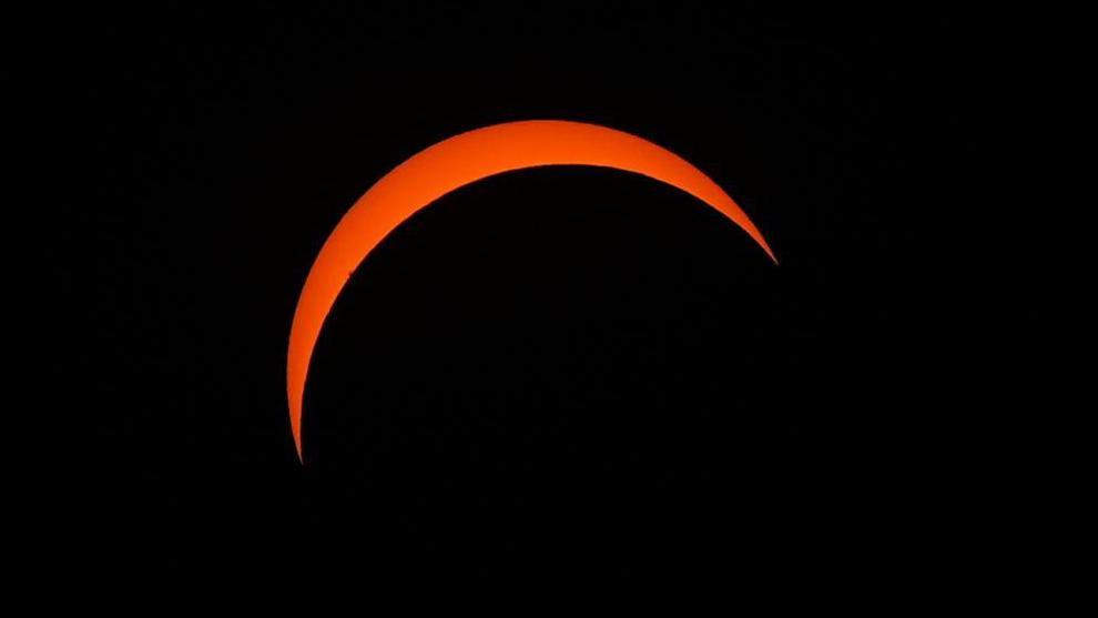 Solar eclipse reaches peak across UK as millions watch once-in-a-generation event