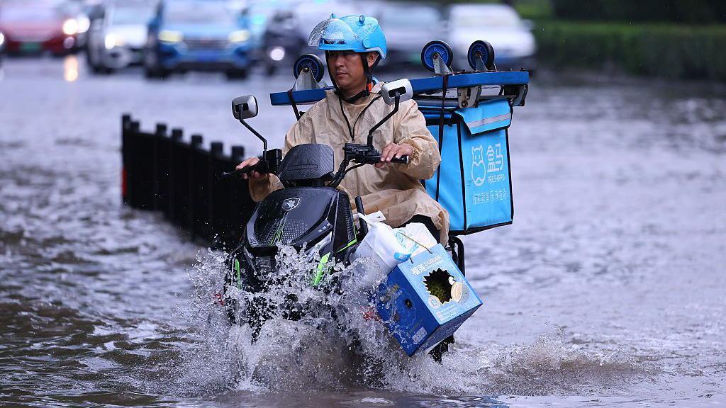 Three storms strike Asia in a week battering millions with heavy rain and strong winds