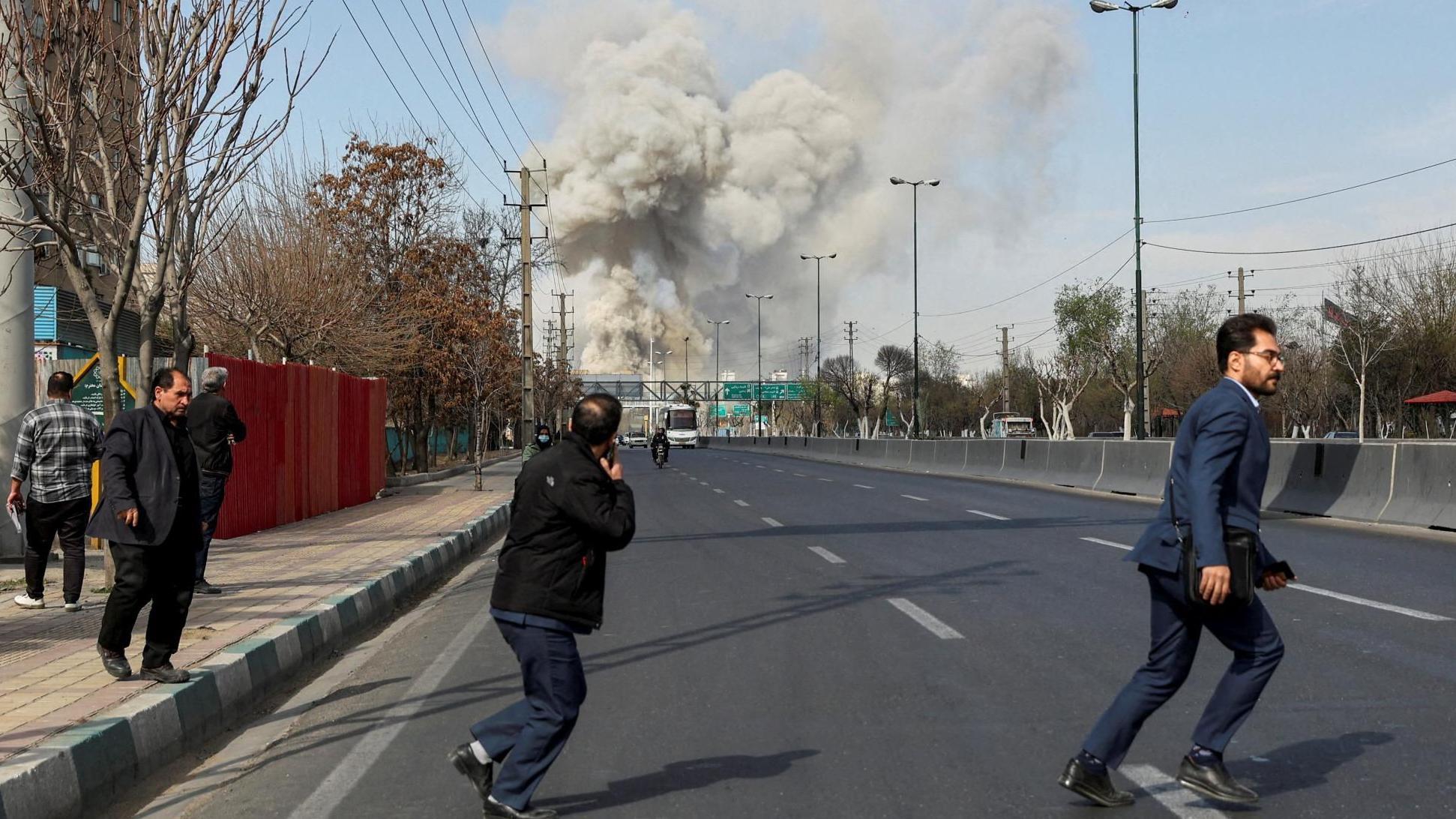 Israel and Iran launch new strikes as first UK flight bringing citizens home is delayed