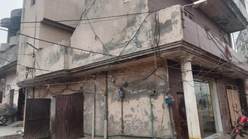 وہ گھر جہاں پر ماں کو ان کے تین بچوں سمیت قتل کیا گیا