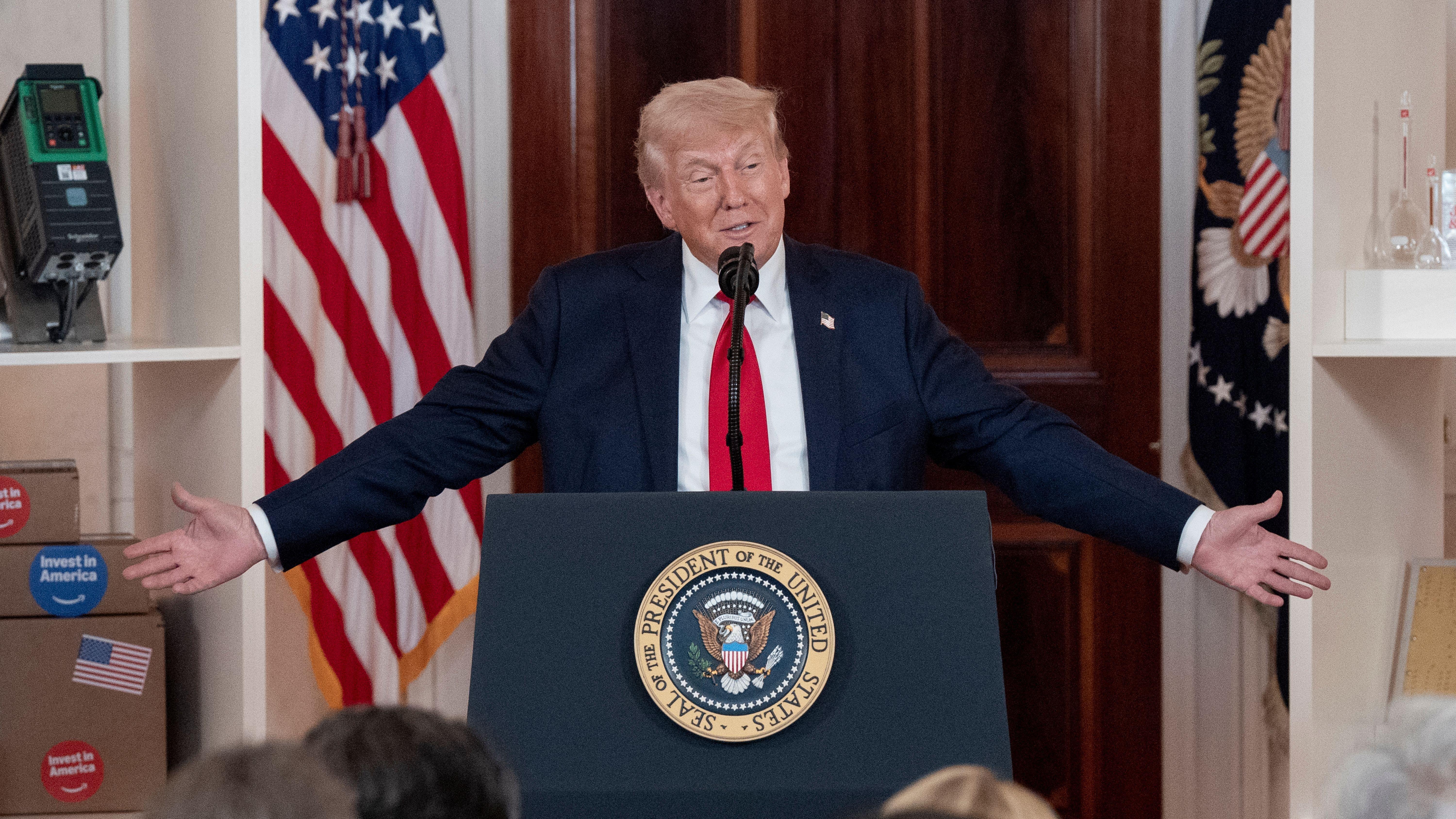 Trump tells business chiefs he needs little bit of time as US economy shrinks
