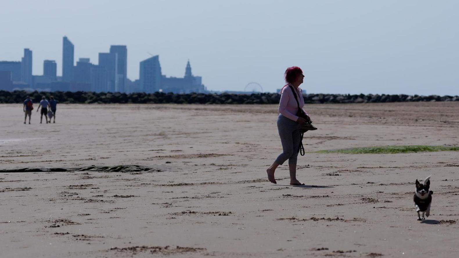 UK braces for hottest June day, as French PM says 40 have drowned in heatwave