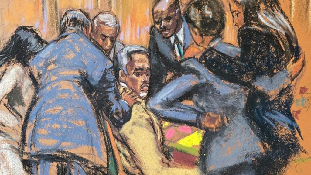 Los abogados defensores consuelan a Sean "Diddy" Combs mientras discuten cómo manejar una nota enviada por los jurados de que habían llegado a un veredicto en cuatro de los cinco cargos en su contra, durante el juicio por tráfico sexual de Combs en la ciudad de Nueva York, Nueva York, EE. UU., el 1 de julio de 2025 en este boceto de la sala del tribunal.