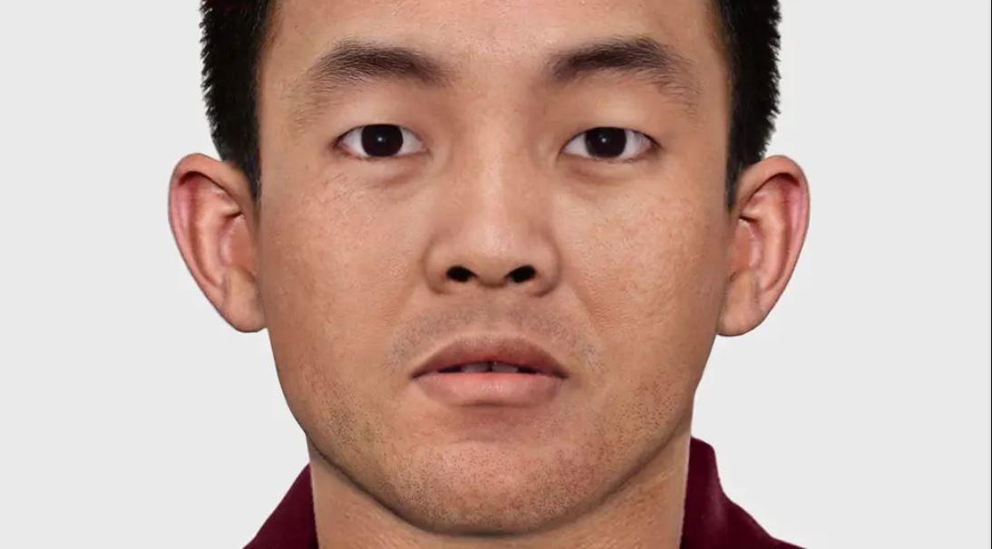 Potret seorang pria Tibet dengan wajah bersih tanpa janggut dan sedikit jubah berwarna merah menutupi bagian atas lehernya.