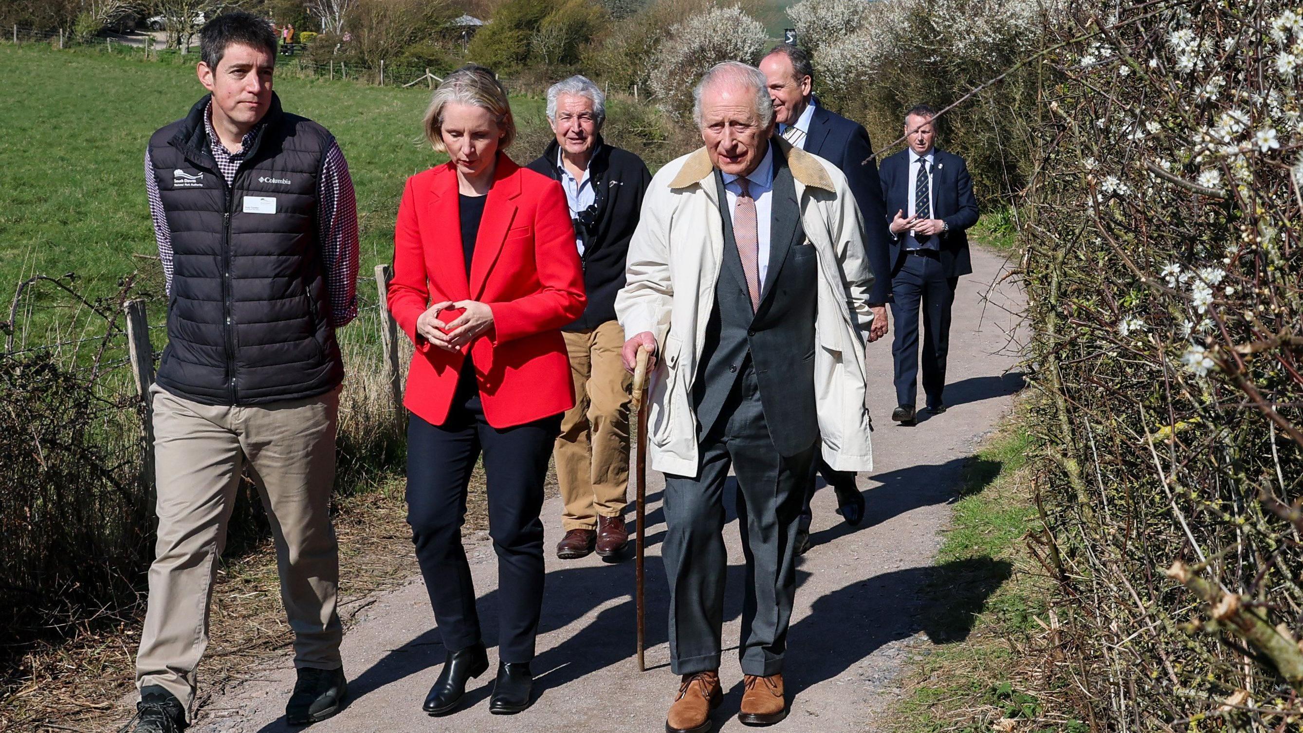 King opens worlds longest coastal path around England 