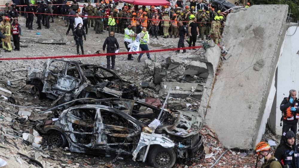 Iran names interim leaders as Israeli rescuers says nine killed in missile attack