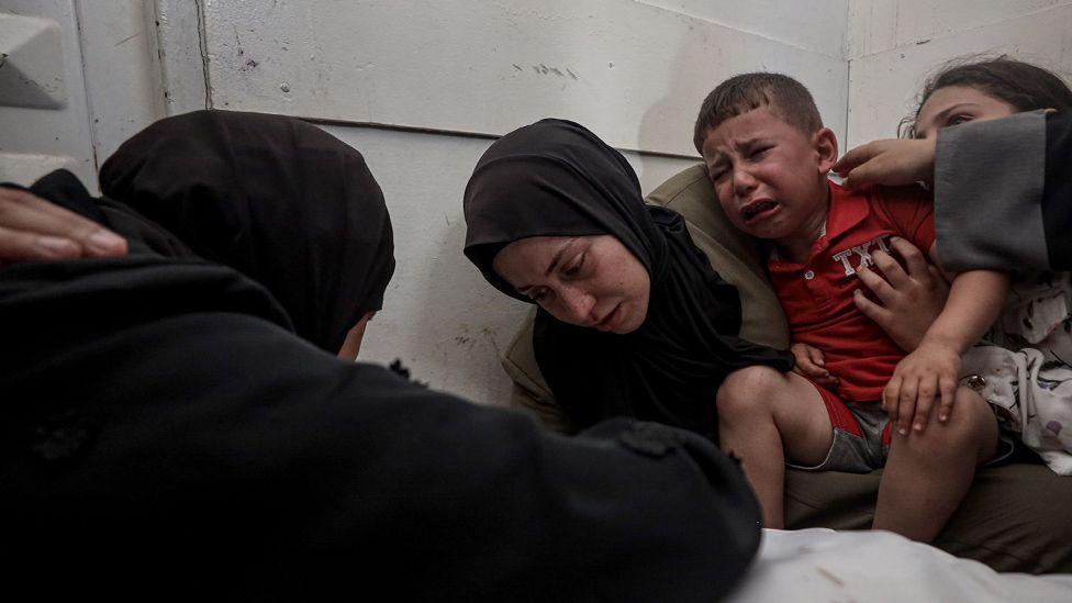 Israeli military kills 23 Palestinians near aid site in Gaza, witnesses and medics say