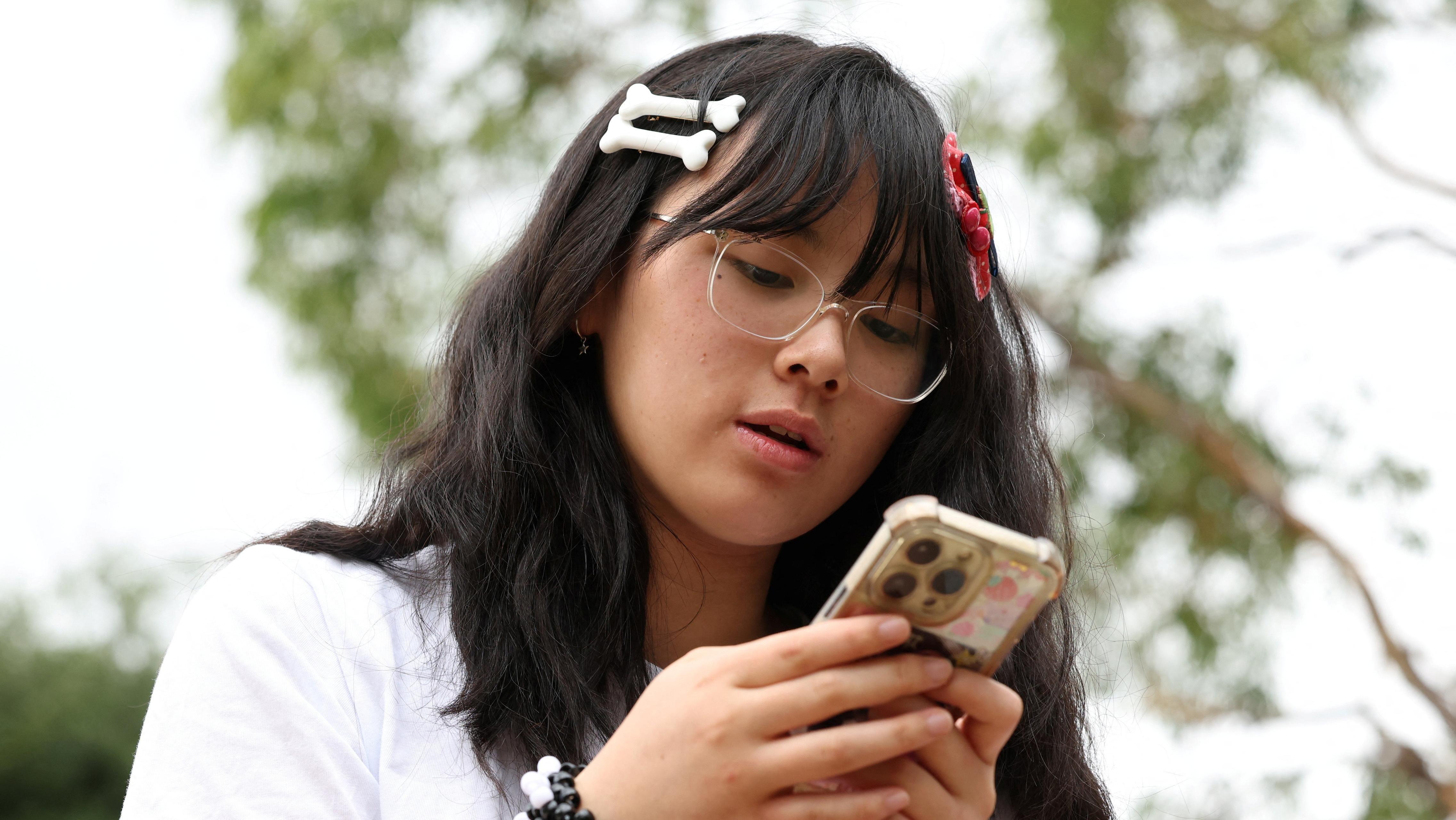 Some Australian teens insulted by social media ban, as others praise a good thing 