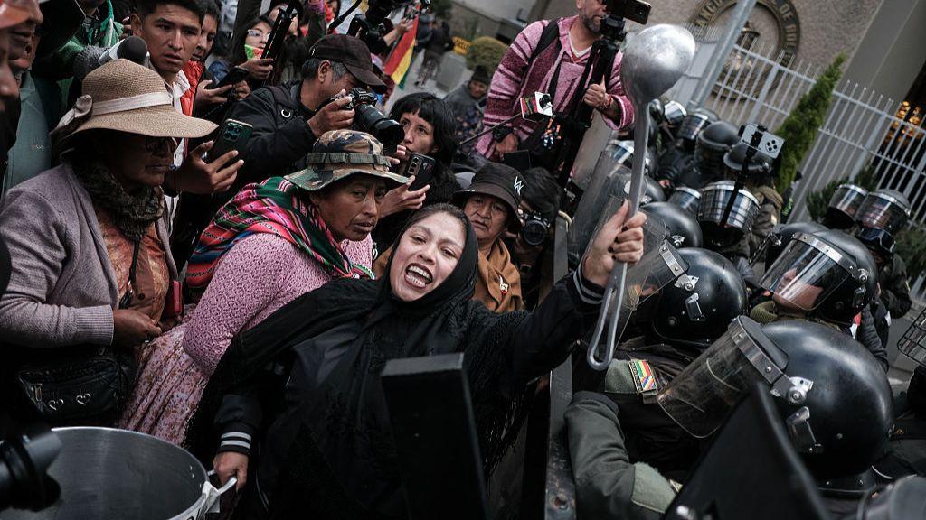 Bolivian president warns country at breaking point after month of protests