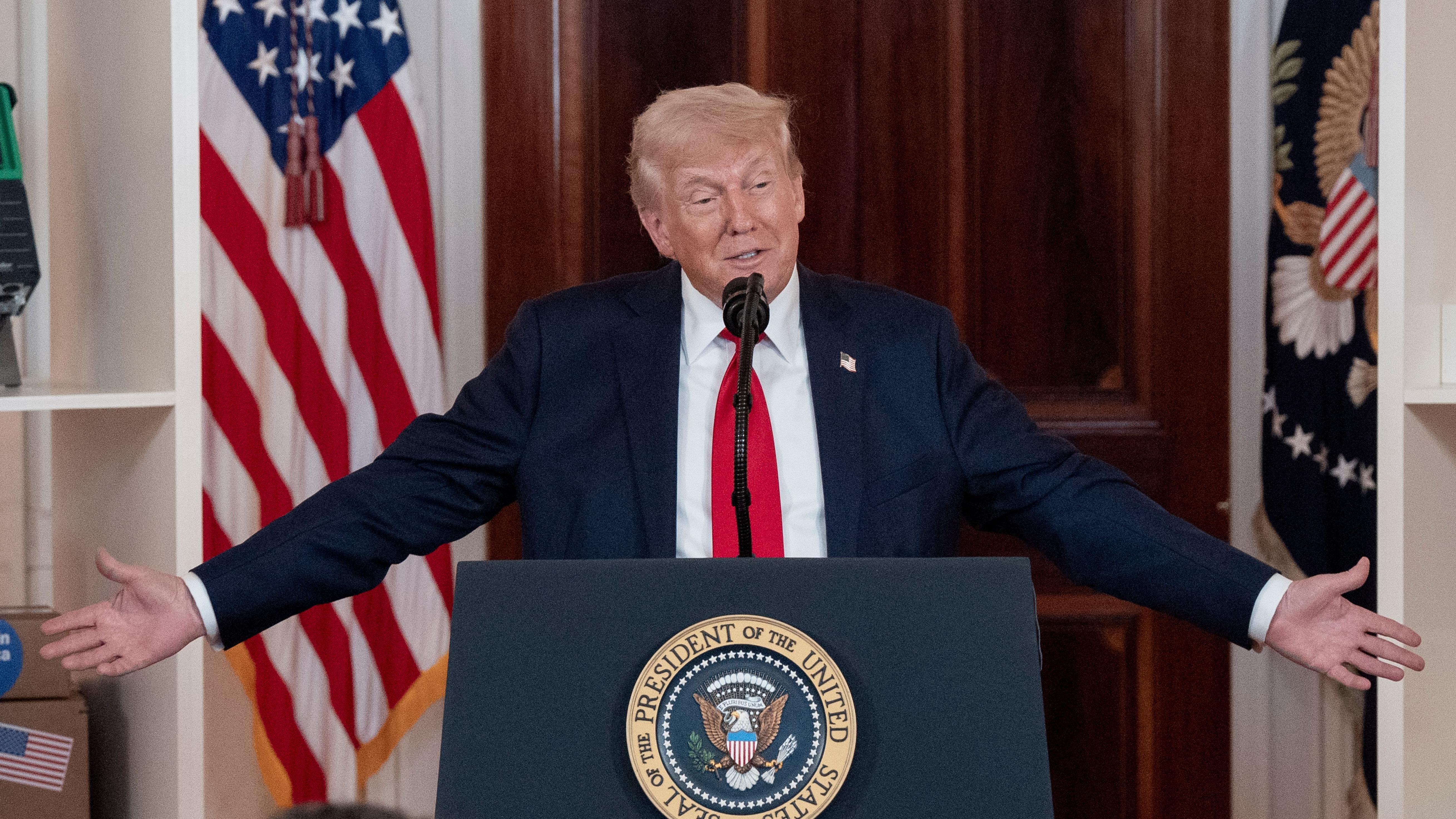Trump tells business chiefs he needs little bit of time as US economy shrinks