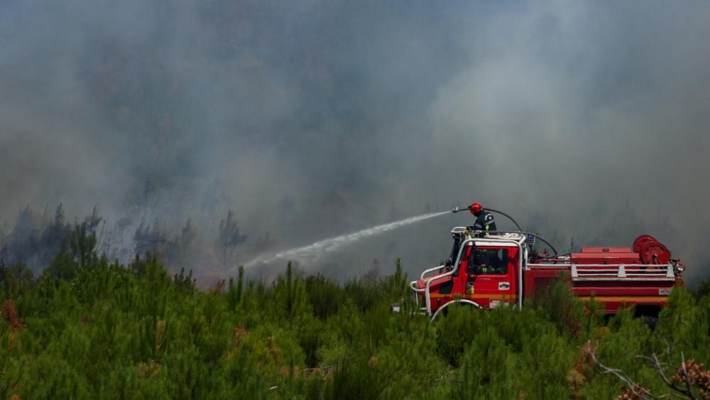 French fire service battles flare-up on coast as Spanish PM warns against lowering guard