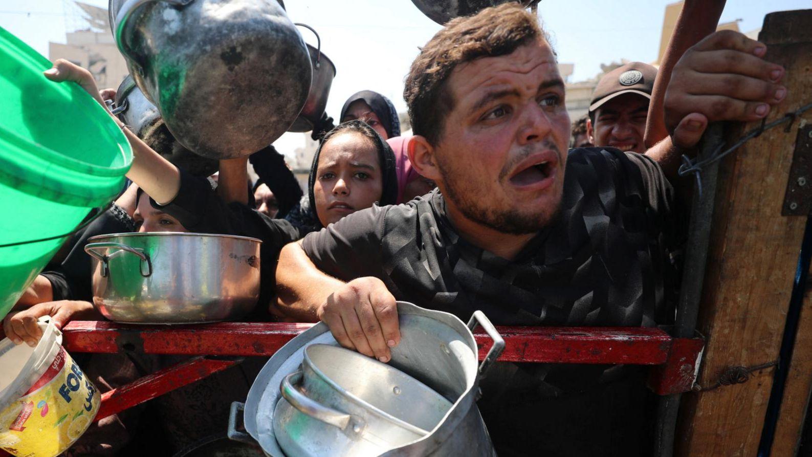 'We are not close to famine, we are living it,' says Gaza doctor as UN warns of 'dire' crisis