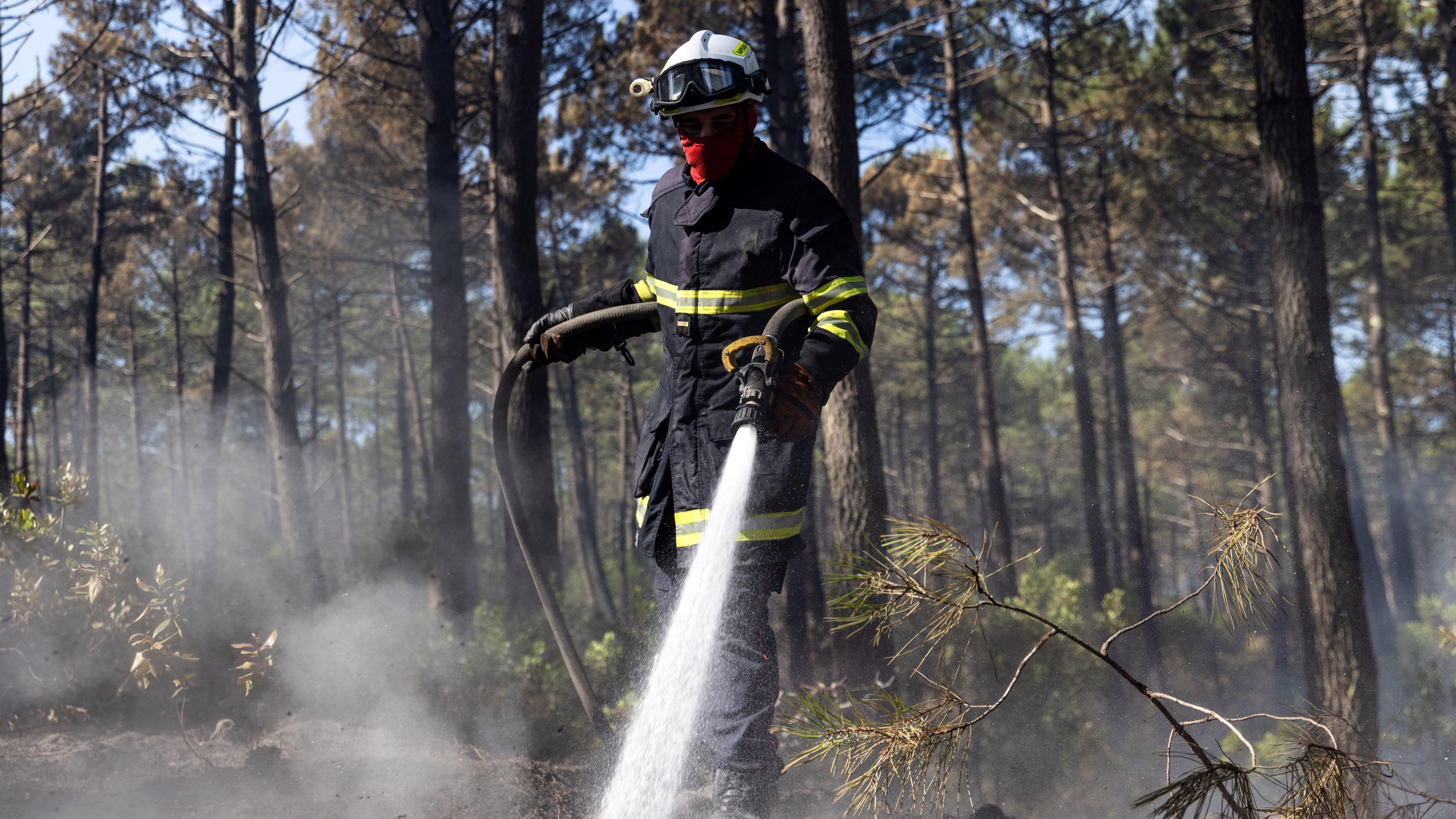 French fire service battles flare-up on coast as Spanish PM warns against lowering guard