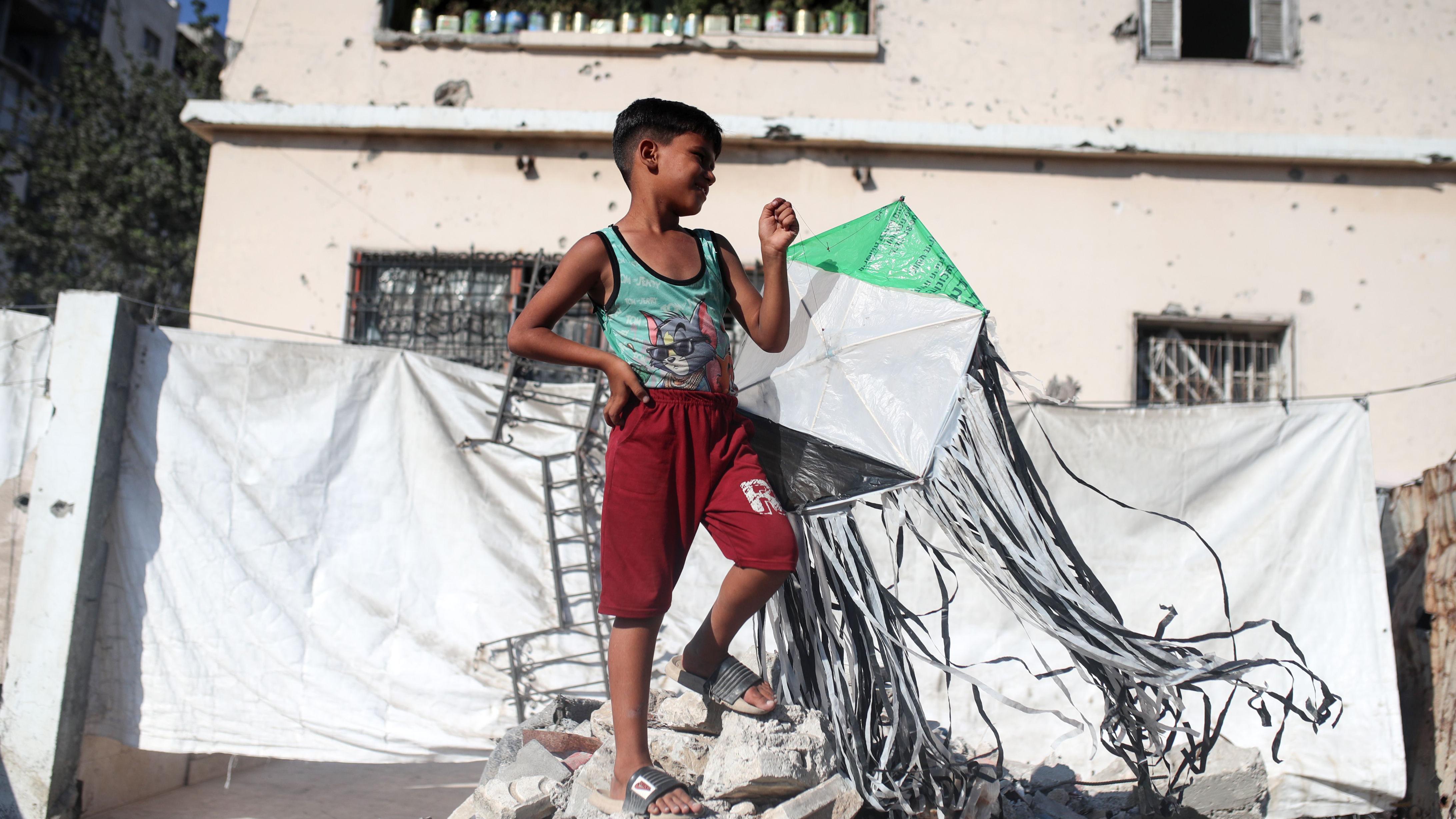 Israel warns of forceful response to kites flown from Gaza