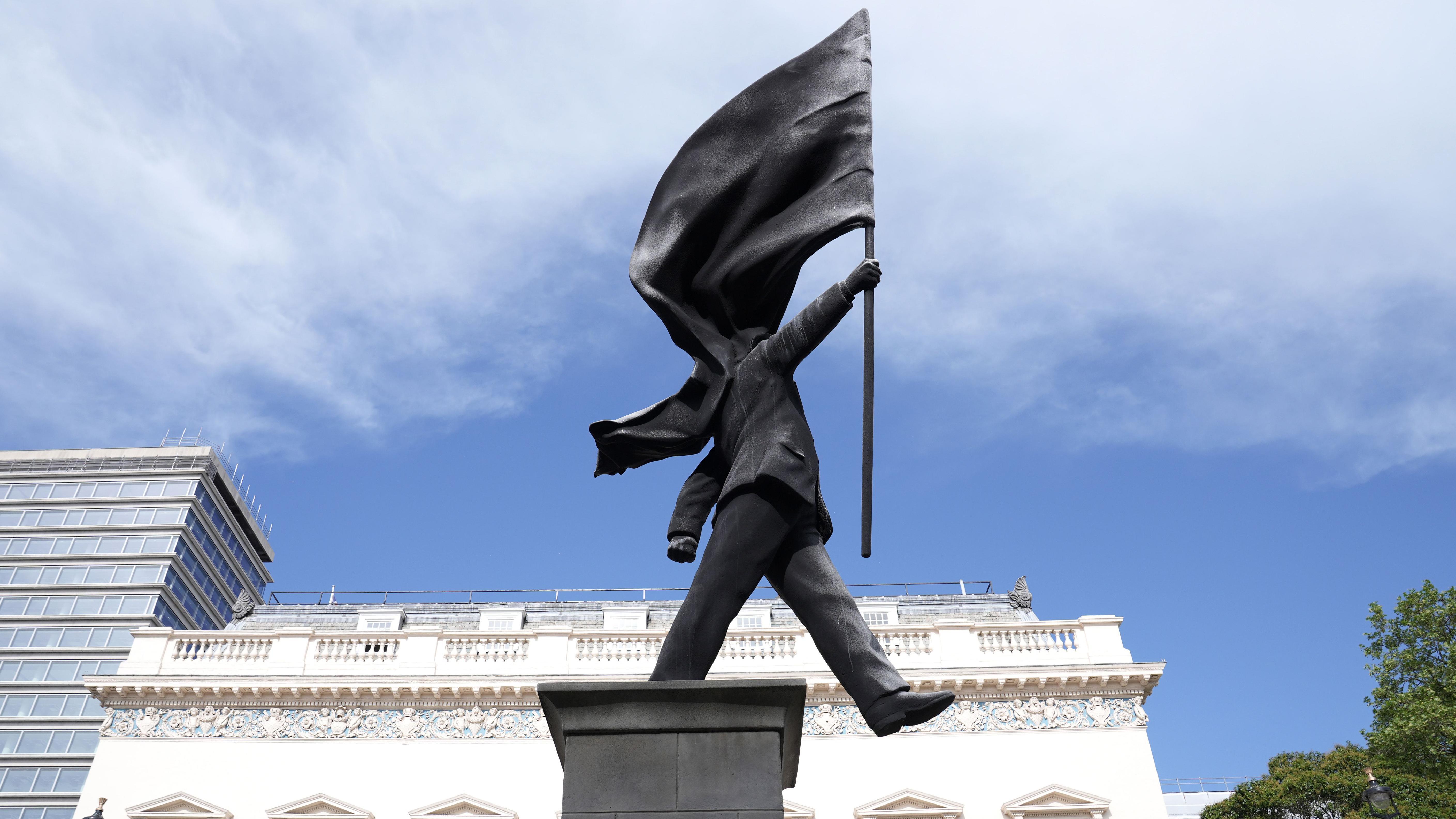 How did Banksy put up a statue in central London?