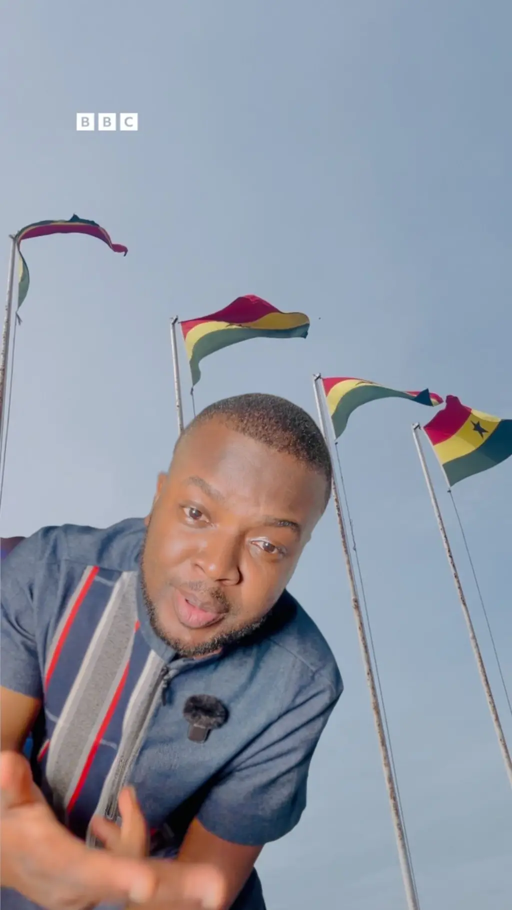 Komla Adom and Ghana flags