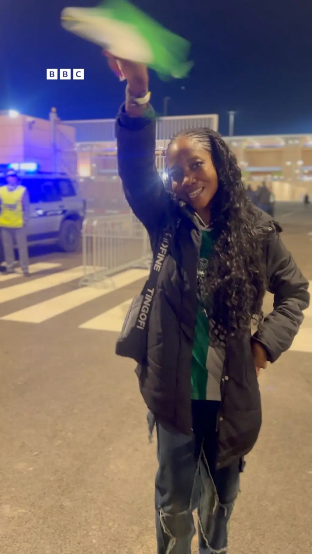 Nigerian fan raising a flag