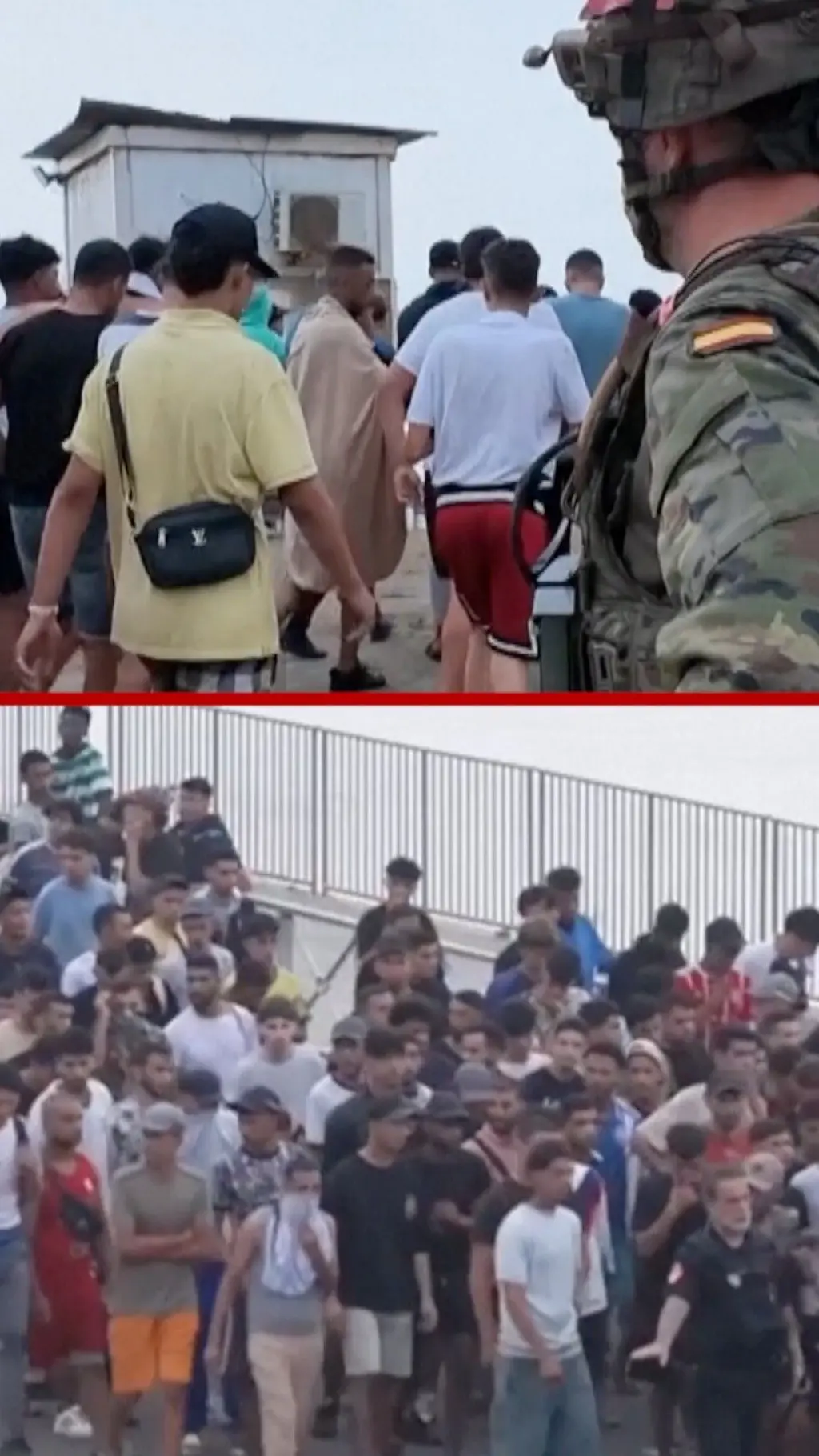Kolone ljudi idu u istom pravcu u pratni policije