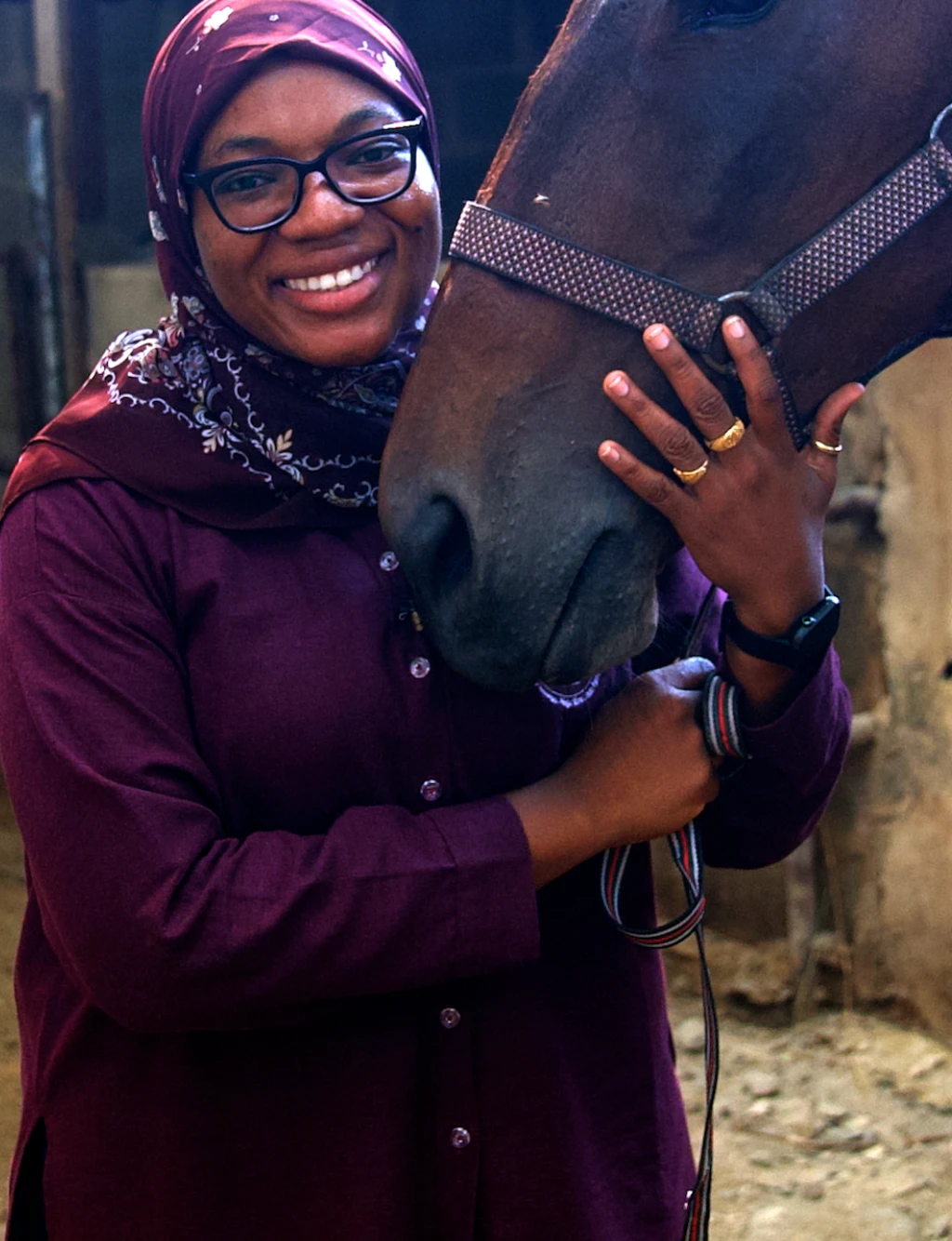 Woman hold horse