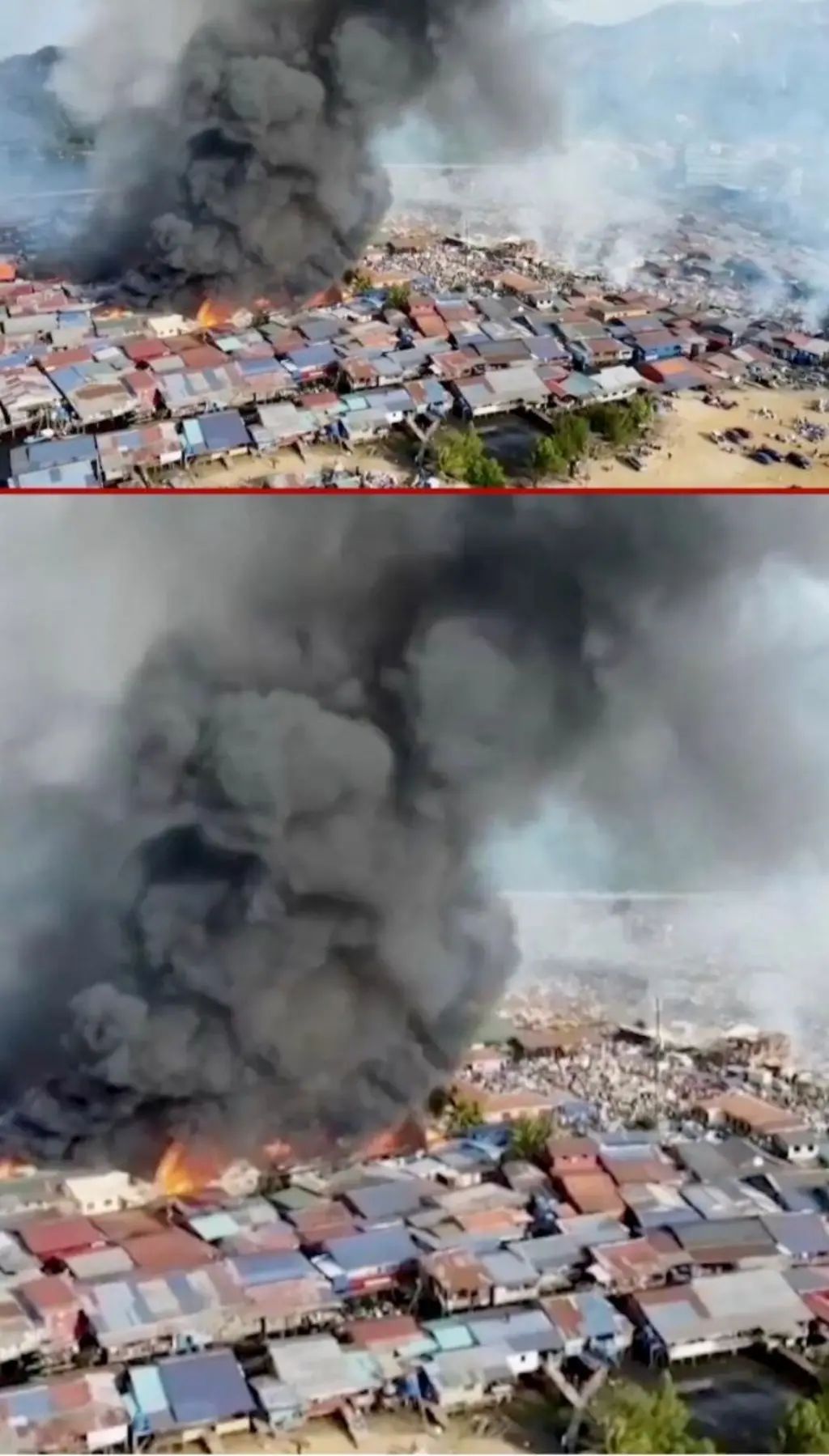 ගෙවල් පෙළකට ඉහලින් කළු දුම් වලාවක් ඇතිවී තිබෙන අයුරු පෙනේ.