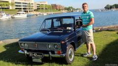 19-летний Роман Грудинин и победитель в классе на фестивале Concours d’ Elegance 2014 года в Гринвиче – 