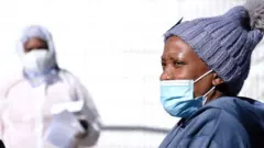 በጆሃንስበርግ በኮቪድ-19 የተያዘ ሰው