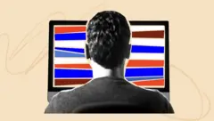 Un homme face à un écran d'ordinateur