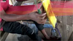 Ìsẹ́yìn nilé aṣọ òkè aláràǹbarà