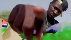 Man dey point finger give camera