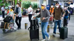 Viajeros en Haikou