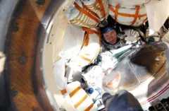 NASA astronauts Richard Arnold, Andrew Feustel and Roscosmos cosmonaut Oleg Artemyev are seen inside the Soyuz MS-08 space capsule shortly after landing in a remote area outside the town of Dzhezkazgan (