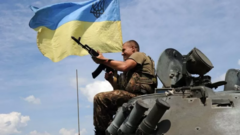 Украинский военный на танке