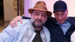 Цукерман і Міндіч в капелюхах 