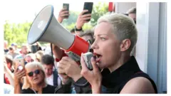 Maria Kolesnikova addressing demonstrators in August