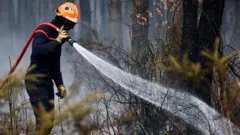 Vatrogasac u mestu San-Žan D'Ilak