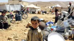 صورة أرشيفية للاجئين سوريين في مخيم في لبنان