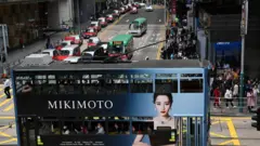 A tram passes by in the Central business district of Hong Kong on February 27, 2024, a day ahead of the city's annual budget to be announced on February 28.