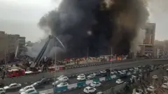 دود سیاه بالای بازارچه جنت تهران در کنار بزرگراه نیایش