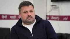 Наумов